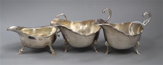A pair of 1930s Asprey & Co silver sauceboats and one other sauceboat, 12.5 oz.